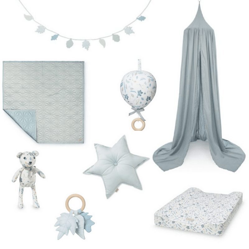 Blue mist nursery design with blue cot canopy sustainable toys star cushion baby quilt and changing mat